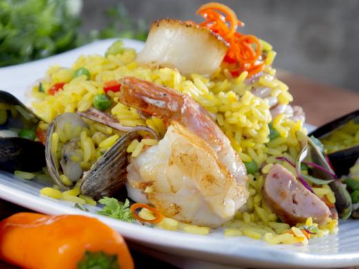 SKOB Entree - Seafood Paella is Chef Gino's featured entree.  Enjoy Mussels, Clams, Scallops, Shrimp and Calamari with Chorizo and Saffron Infused Rice Photo 3