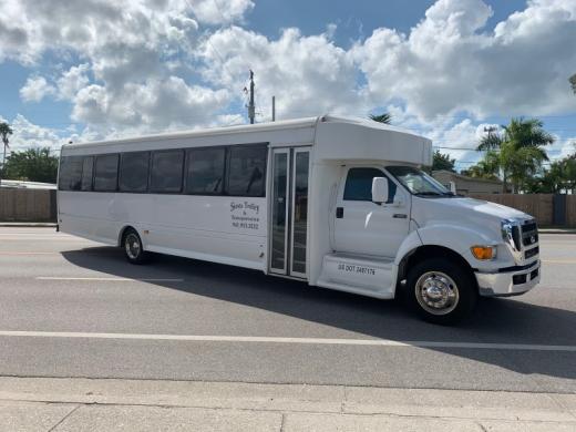 Large Minibus - 36 passenger capacity with luggage space. 
Take you group to the airport or to the concert or just out about town! Photo