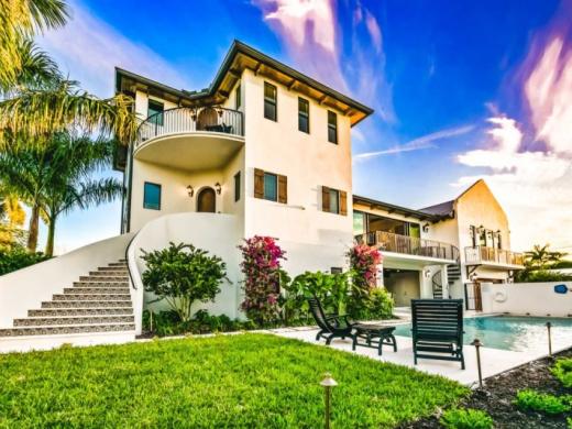 The Big Top - You'll love the multiple Balconies and patios to take in your morning coffee and enjoy the beautiful Florida weather. You'll also fall in love with the Private Heated Pool area with a... Photo 4