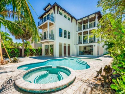 Shore House - This absolutely stunning, 3 level Lido Key Coastal Home features 7 Bedrooms - including a Huge Master Bedroom with En Suite Bathroom, and 4.5 Bathrooms throughout the home. Photo 5