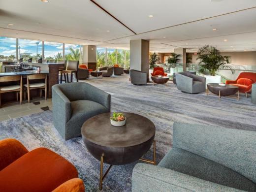 Icon Loft - Enjoy the relaxing ambiance of the upstairs Icon Loft area, complete with a bar, and intimate seating areas. Photo 3