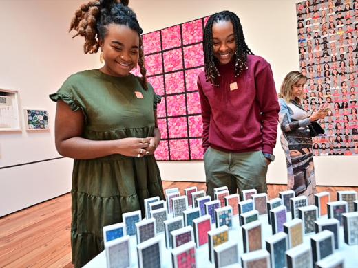 “Scrollathon” - Visitors viewing “Scrollathon,” October 17, 2022-February 2, 2023, Sarasota Art Museum. Photo by Daniel Perales. Photo 4