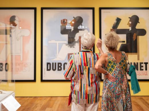 “Art Deco: The Golden Age of Illustration” - Visitors viewing “Art Deco: The Golden Age of Illustration,” August 31, 2-25-March 29, 2026, Sarasota Art Museum. Photo by Peter Acker. Photo 5