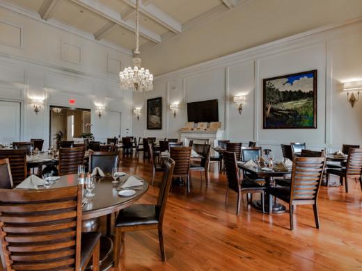 Bistro Dining Room - The Bistro dining room overlooks the golf course 18th green. Photo