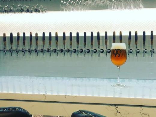99 Bottles Taproom & Bottle Shop - a rotating selection of craft beers, kombucha, and cold brew coffee from 34 draft taps... Photo 3