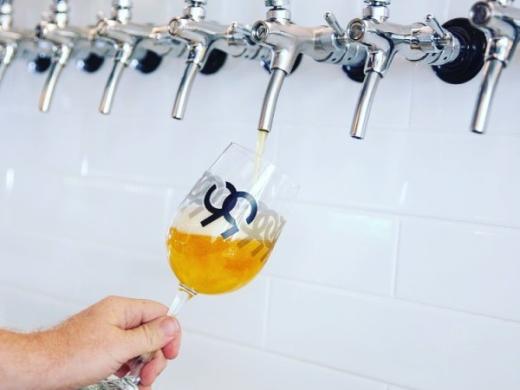 99 Bottles Taproom & Bottle Shop - pouring exceptional craft beer... Photo 4