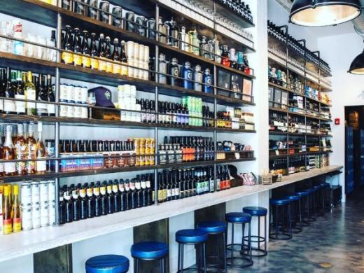 99 Bottles Taproom & Bottle Shop - "the wall"
a well-curated selection of craft beers to go... Photo 6