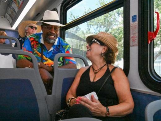 Passengers on Breeze bus - Breeze routes 2, 76, 77, and 99 connect to popular visitor destinations. Photo 3