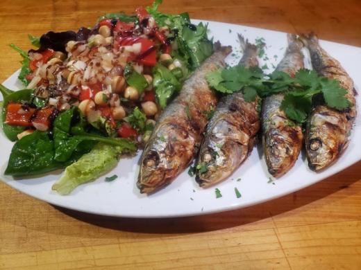 Sardinhas Assadas - Grilled Sardines served with a side of chickpeas salad. Photo 3