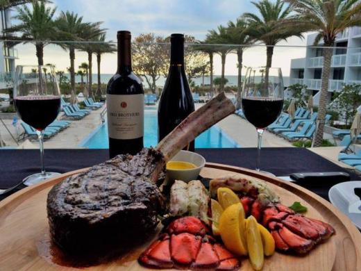 Dining in Vientos Restaurant - Indoor / Outdoor Dining with Views of the Gulf of Mexico, serving breakfast, lunch, and dinner! Photo 4