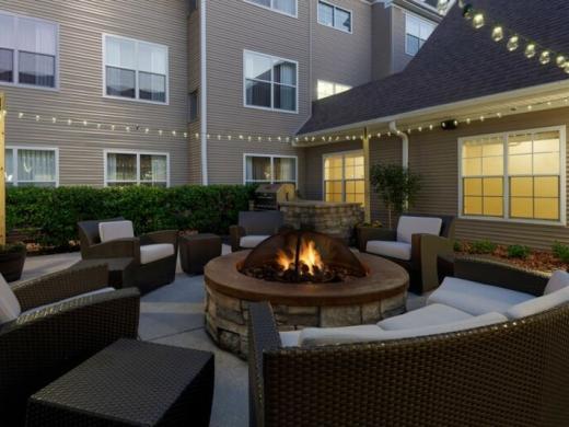 Patio Firepit & Grill - Enjoy our outdoor patio area complete with comfy seating, firepit and BBQ grill for guests to utilize. Photo 2
