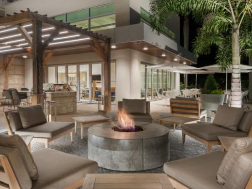 Fire Pit HWS - Homewood Suites by Hilton Sarasota, a fire pit outside for guests to relax and enjoy the evening Photo 2