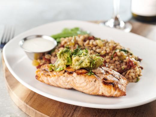 AVOCADO SALMON - Fresh cold water Chilean salmon, avocado salad, citrus crema, snow peas, Mediterranean farro Photo