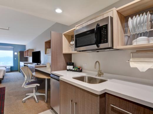 Guest Room - The comfort of home, a spacious guest room along with a full size refrigerator/freezer, dishwasher, microwave kitchenet Photo 6