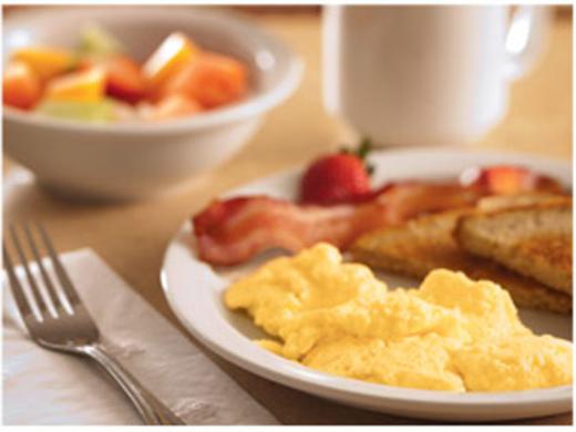 Free Hot & Cold Breakfast Buffet - Enjoy free hot & cold breakfast buffet which features a rotating menu with eggs, breakfast meats, oatmeal, waffles, assorted breads and pastries, fresh fruit, yog... Photo 4