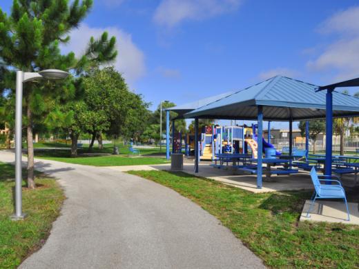 David Cohen Park - A walking trail with work-out stations, two sheltered playgrounds available for party rentals. Photo 2