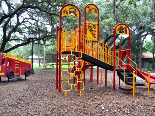 Firehouse Park - This park has a fun “Firefighter” inspired design. Come “rescue” the day! Playground, swing-set, picnic tables & grill and allows leashed pets. Photo 2