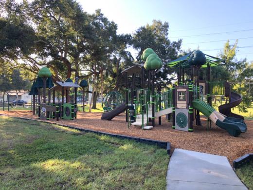 Pioneer Park Playground - Enjoy the tree-top inspired playground! Photo 2