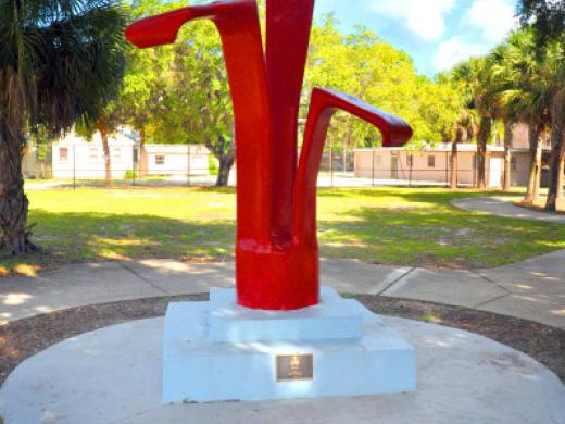 Encore Sculpture - Home for the Encore sculpture created by Saul Howard in 1975. The Red-painted concrete sculpture stands over 10 ft. tall! Photo