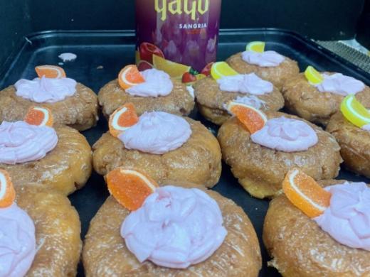 Sangria Donut - Glazed Orange Cake Donut topped with Sangria buttercream. Photo 3