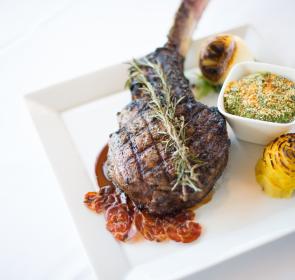 Steak dish with sauce and potatoes
