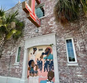 Mural on the side of the West coast Black Theatre