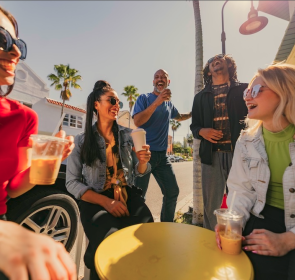 group of young people having coffee in downtown