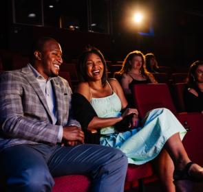 couple laughing inside the theater in sarasota