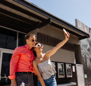 couple outside of urbanite theatre in downtown sarasota