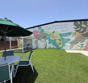 Pinecraft mural outside of pie craft coffee co