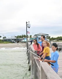 family fishing at venice pier