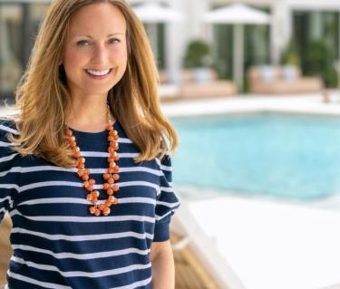 Erin M. Duggan by a pool