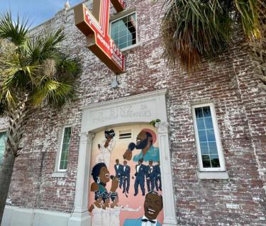 Mural on the side of the West coast Black Theatre