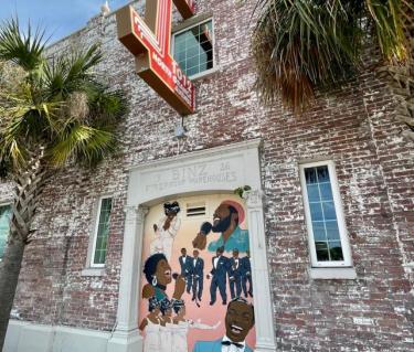 Mural on the side of the West coast Black Theatre