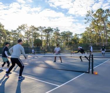 people playing pickleball