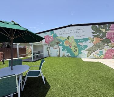 Pinecraft mural outside of pie craft coffee co
