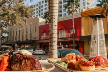 Food on a table with downtown Sarasota in the backgrond