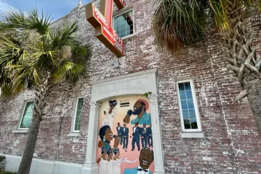 Mural on the side of the West coast Black Theatre