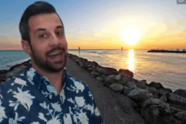 Guy in front of Zoom background of Venice Beach