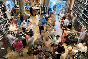 Open House Guests inside Michael's Wine Cellar