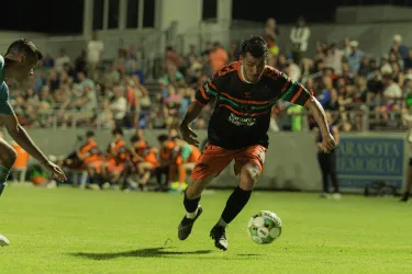 Sarasota Paradise player kicking a ball