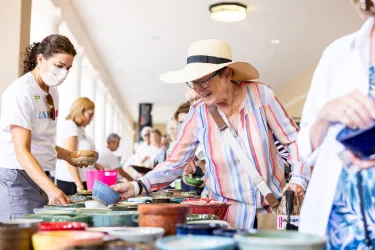 During All Faiths Food Bank's Bowls of Hope event, guests choose from beautiful, handcrafted bowls to keep
