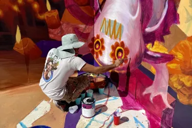 artist painting at the sarasota chalk festival