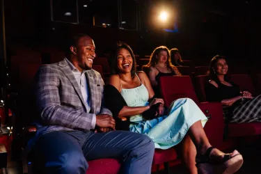 couple laughing inside the theater in sarasota