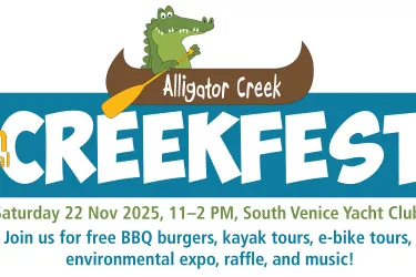cartoon alligator paddling canoe with text "Alligator Creek Fest!"