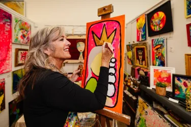 artist painting in sarasota studio