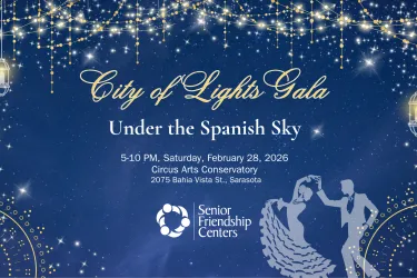 Promotional banner for the City of Lights Gala titled “Under the Spanish Sky,” featuring a deep blue starry night background with golden string lights and hanging lanterns. Event details read: Saturday, February 28, 2026, 5–10 PM at Circus Arts Conservatory in Sarasota. The Senior Friendship Centers logo appears at the bottom alongside a silhouette of a couple dancing flamenco, evoking elegance, celebration, and connection.