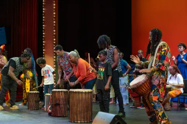 African drumming group Fethiou Thiossane performing during the 2025 Juneteenth Arts Festival