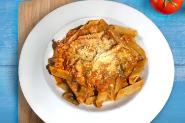Trenne Dolce Italia - Our signature specialty- triangle pasta with creamy tomato sauce, mozzarella, tomatoes, mushrooms, and parmigiano. Can add sausage or meatballs. Photo