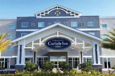 Carlisle Inn Sarasota - A lovely 100-room hotel located in the Pinecraft community, the heart of Sarasota's Amish settlement. Stay in peace and comfort, just minutes away from Sarasota's top-ranked... Photo